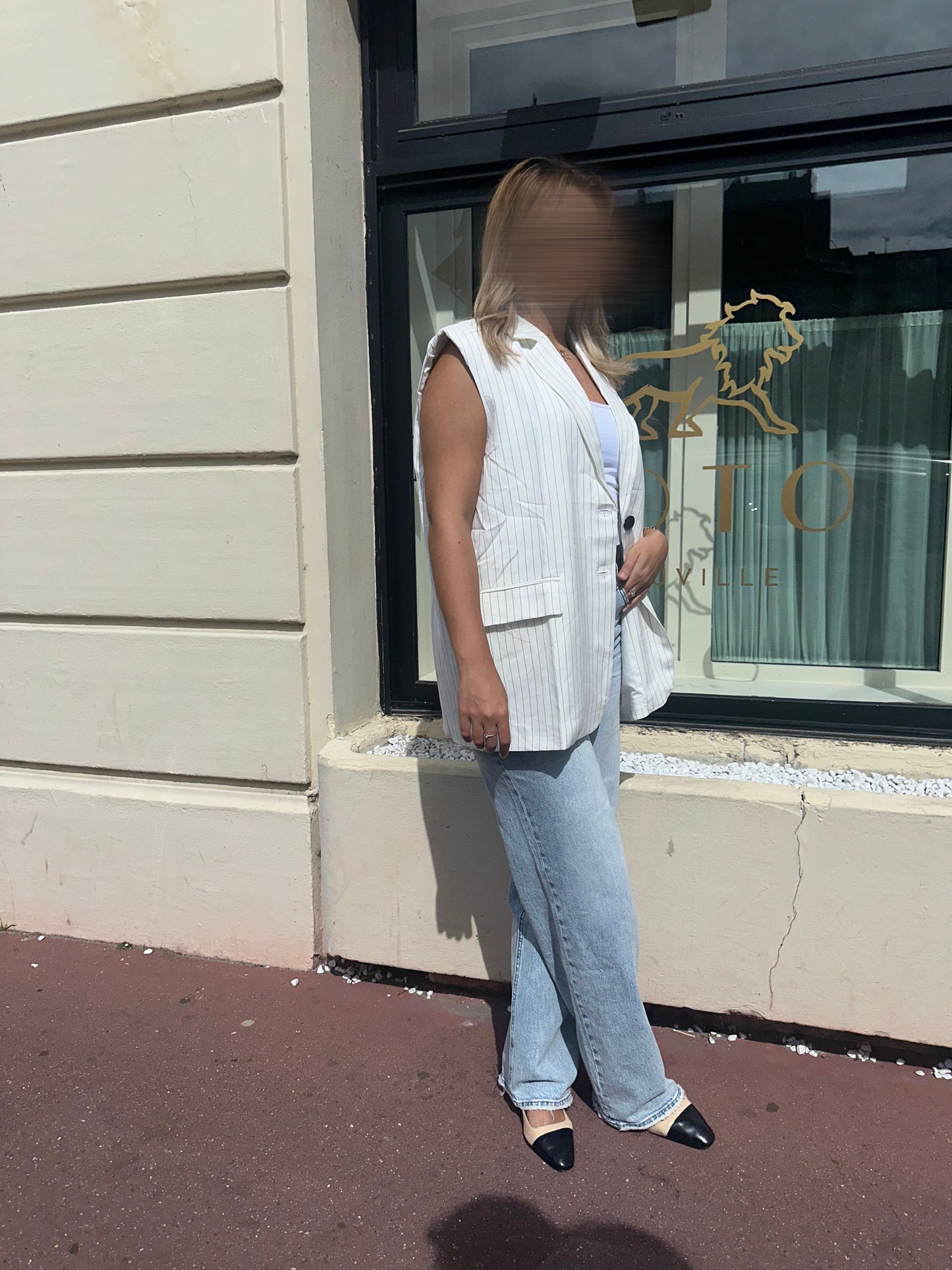 Blazer sans manches dos ouvert blanc rayé